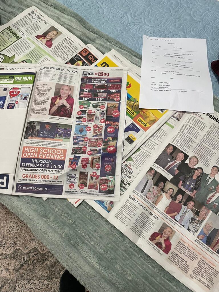 Photo of Newspapers and Magazines Covering Chamtrul Rinpoches Visit and Teachings at Eagles View Yoga Studio, KwaZulu Natal, SA 2025